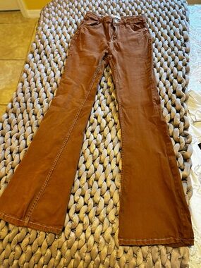 Bershka High-Rise Flared Jeans in Rust